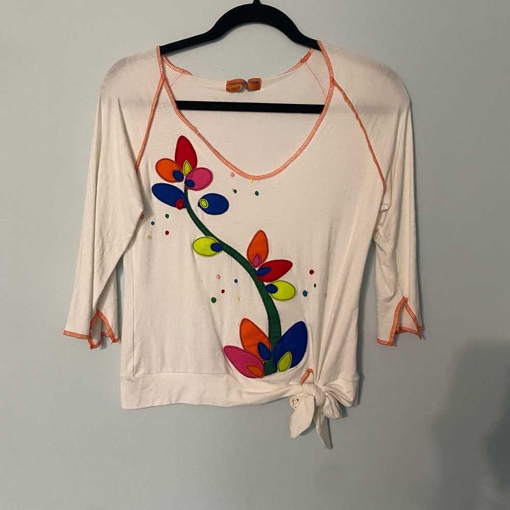 shirt from small company, tag is ripped but is a small/medium. super comfy